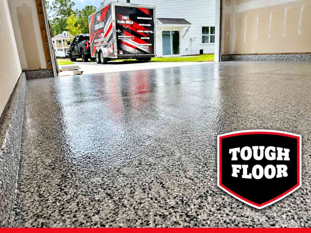 Glossy flake garage floor with the Floor Shield trailer