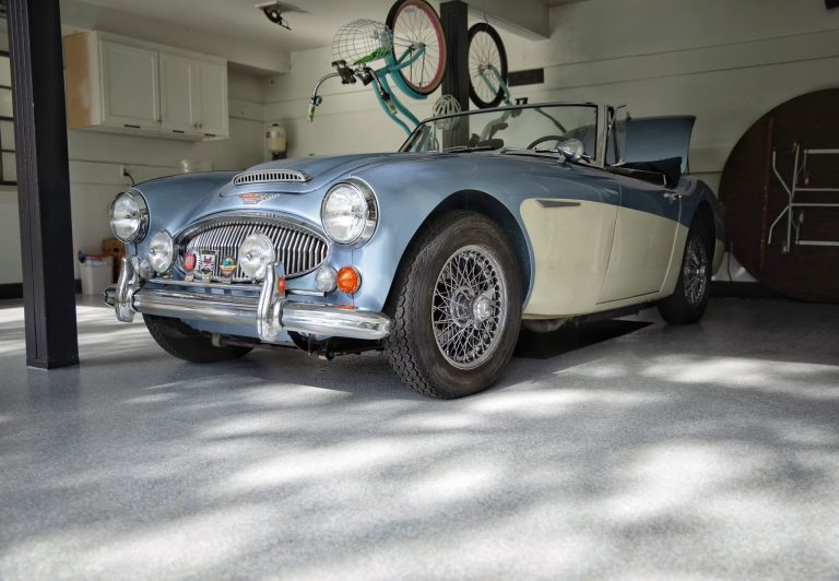 Classic car parked on a new flake garage floor coating