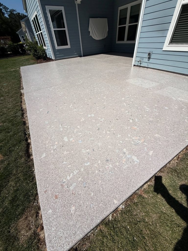 Coated backyard patio slab