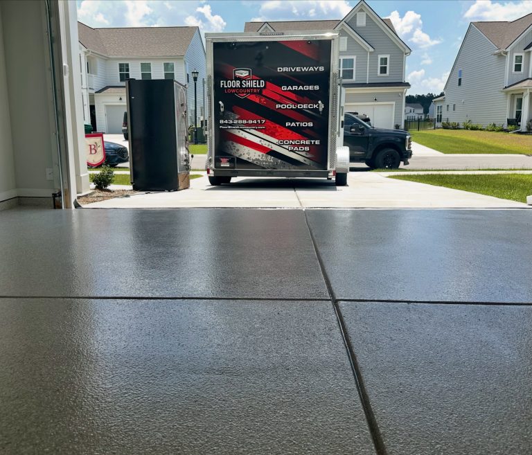 Glossy coated garage floor at the open door