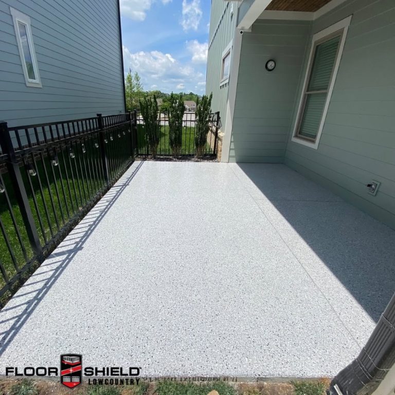 Flake coated upper balcony with a railing