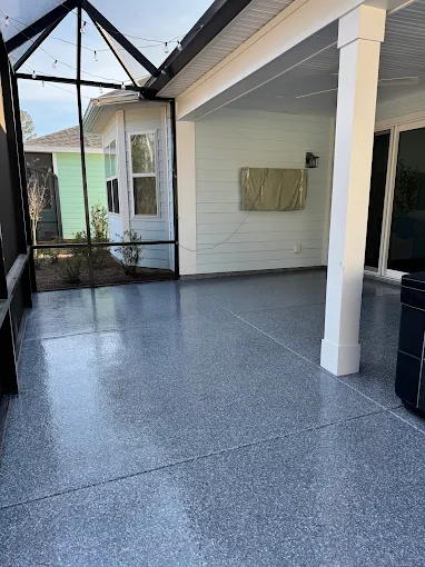 Covered porch with a blue-gray flake floor